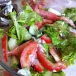 Tasty salad with olive oil