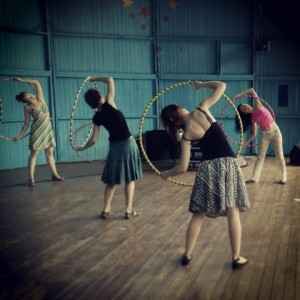 exercise with a hula hoop